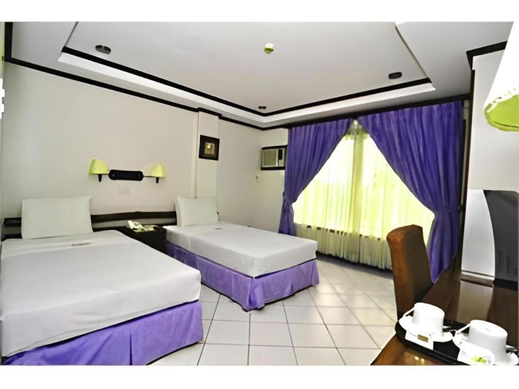 Soledad Suites Panglao-stad Buitenkant foto